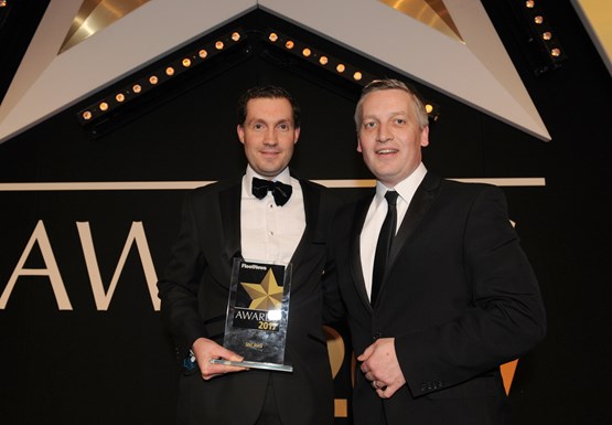 Peter McDonald, Seat UK head of fleet & business sales (left), picks up the award from Elliot Scott, fleet director, Thrifty Car & Van Rental