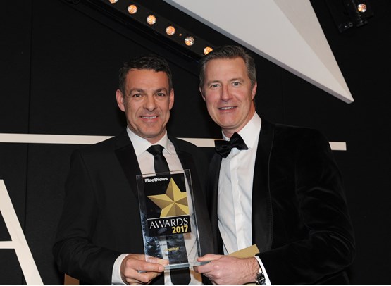 Royal Mail fleet director Paul Gatti (left) collects   the trophy from Zenith commercial director Ian Hughes
