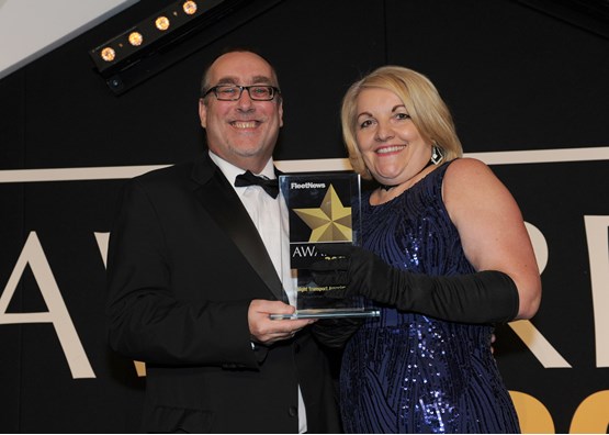Freight Transport Association head of vans Mark Cartwright receives the award from Fleet News Buying Group operations director Jayne Pett
