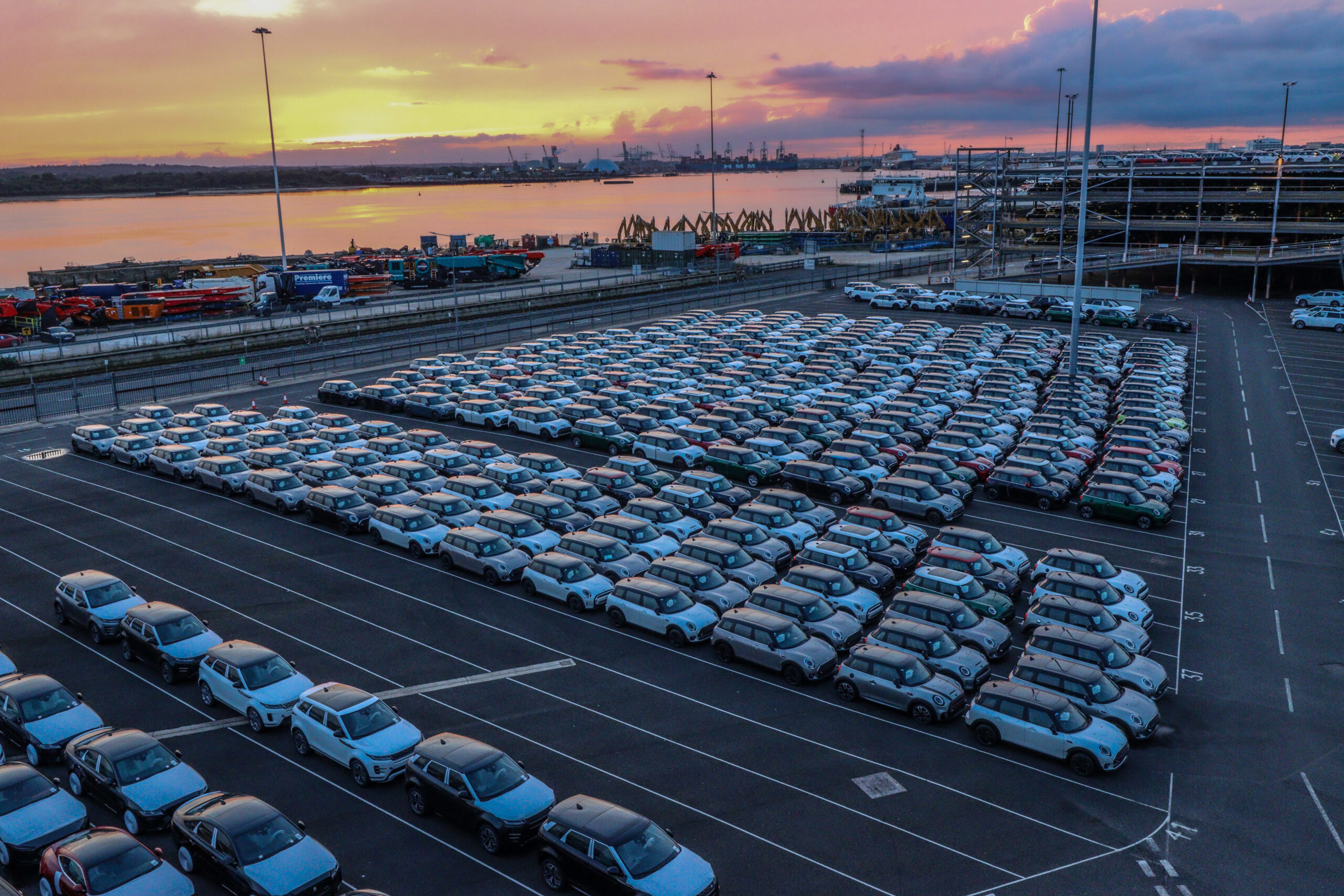 Global EV sales set for record-breaking year but long-term outlook cut